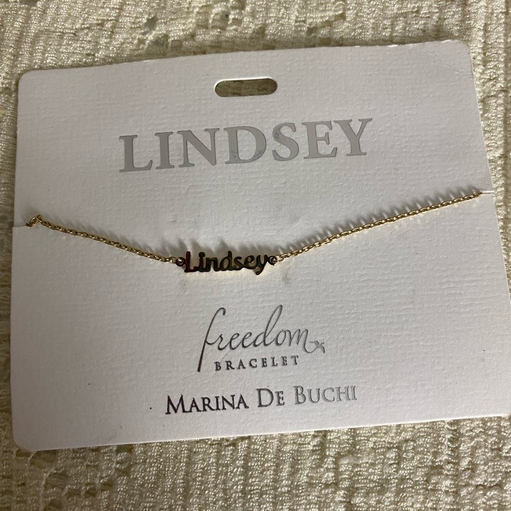 Marina de Buchi Freedom name bracelet: “Lindsey” Goldtone nickel free
